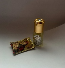 Набор: Миро, Ладанка из парчи на булавке с ликом Святителя Спиридона Тримифунтского и Божией Матери с другой стороны